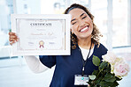 Certificate, flowers and portrait with a black woman graduate or nurse in the hospital, proud of her achievement. Smile, graduation and qualification with a happy young female standing in a clinic