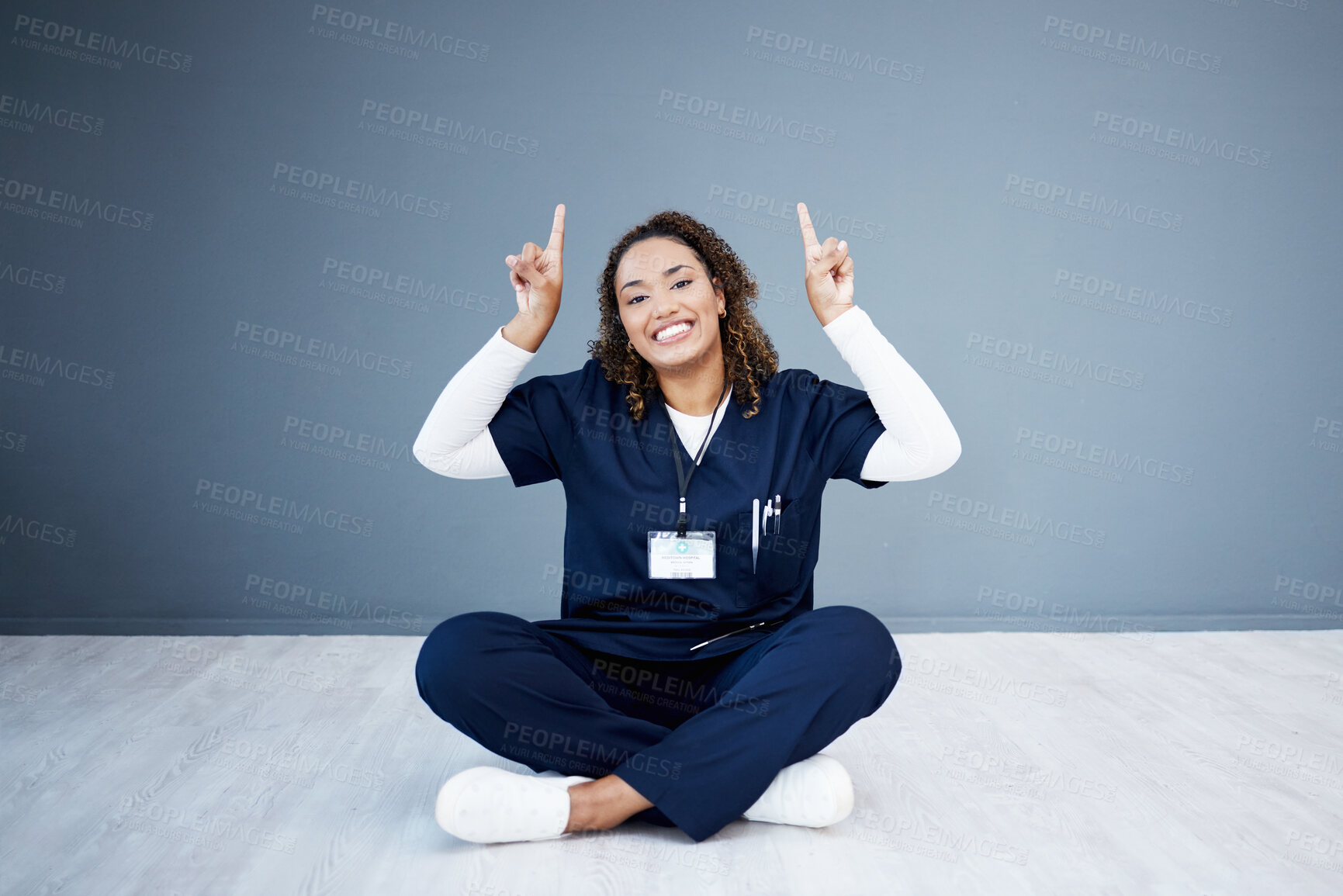 Buy stock photo Nurse, portrait or pointing up at hospital promotion, life insurance deal or advertising mockup space. Smile, happy or doctor showing hands at woman healthcare, wellness mock up or volunteer branding