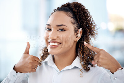 Buy stock photo Thumbs up, happy and portrait of a woman with a hearing aid pointing to her ear in the office. Happiness, success and young professional female with a deaf piece and a approval gesture in workplace.