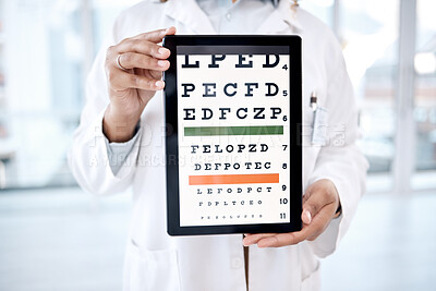 Buy stock photo Hands, tablet screen and optometry chart in hospital for vision examination in clinic. Healthcare, snellen or woman, ophthalmologist or medical doctor holding technology showing letters for eye test.