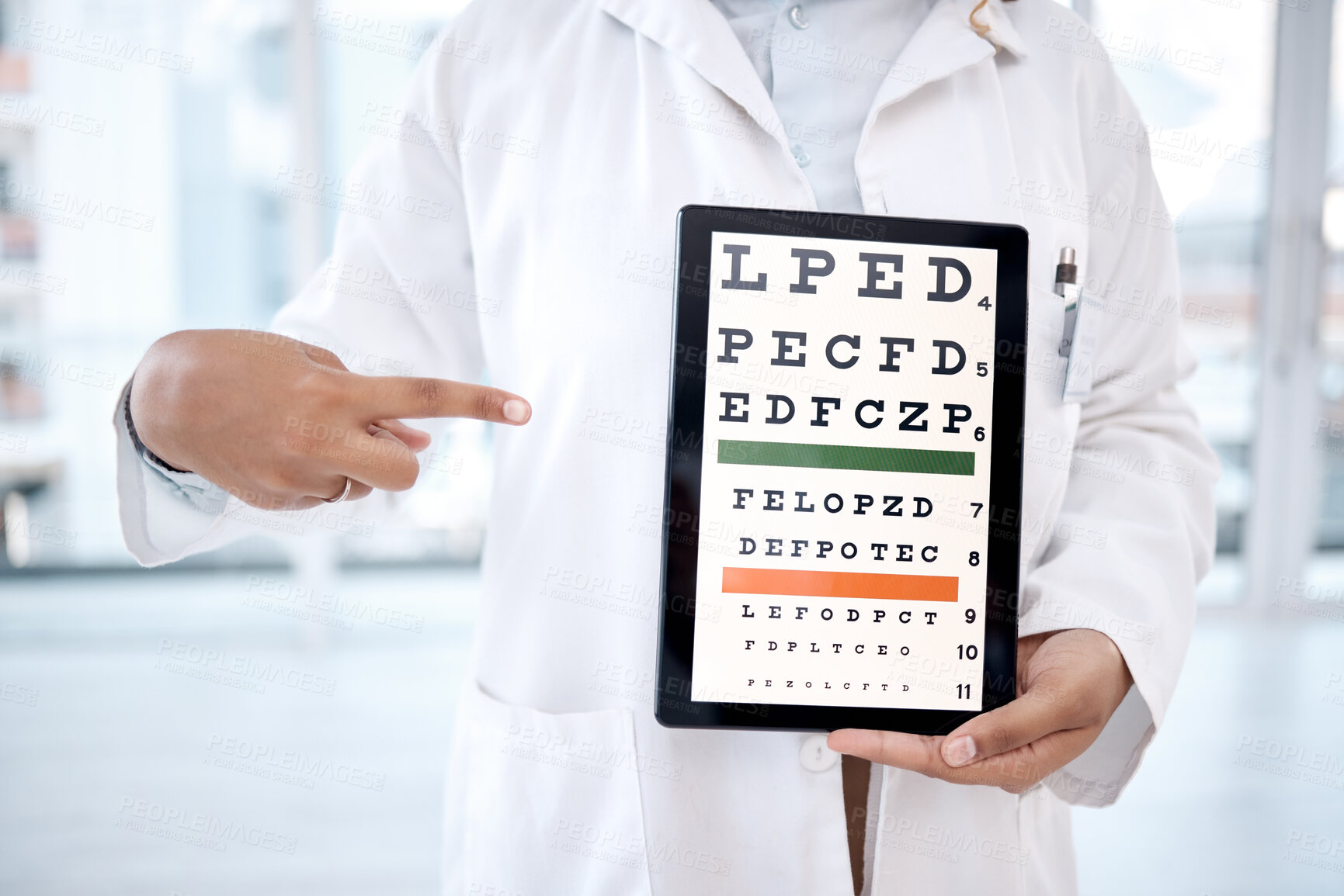Buy stock photo Hands, tablet screen and eye chart in hospital for vision examination in clinic. Healthcare, snellen or woman, ophthalmologist or medical doctor pointing to technology showing letters for eyes test.