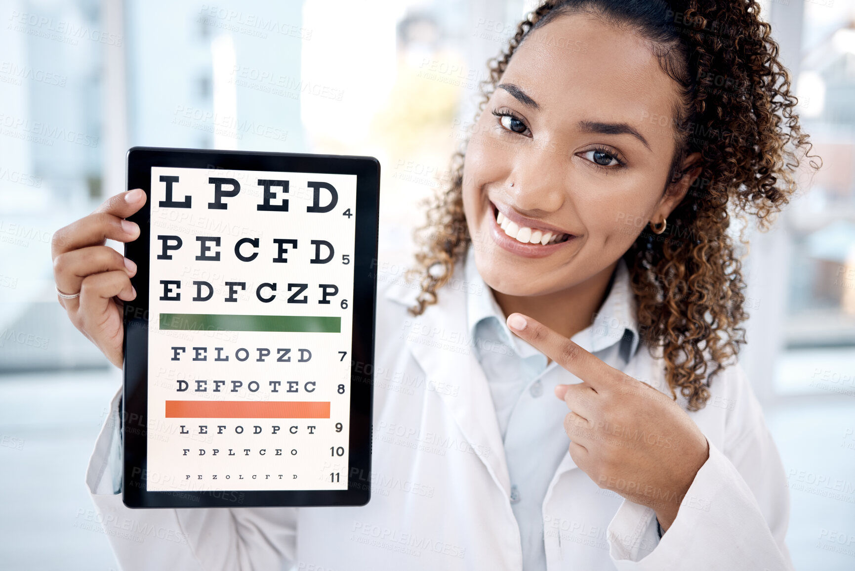 Buy stock photo Optometry chart, tablet and portrait of doctor in hospital for vision examination in clinic. Healthcare pointing, snellen touchscreen and optometrist or black woman with tech with text for eyes test.