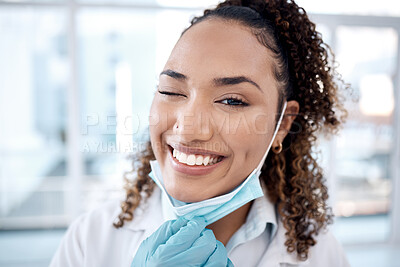 Buy stock photo Wink, covid and portrait of doctor happy and excited with a positive mindset in the hospital after coronavirus ending. Face, medical and healthcare professional or worker smile and confident