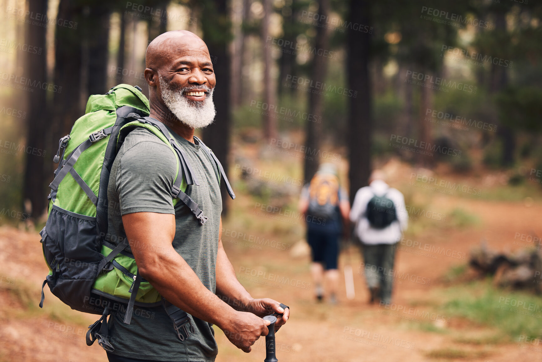 Buy stock photo Portrait, black man and hiking in forest, exercise and fitness for wellness, healthy lifestyle and smile. Face, senior male and mature gentleman with backpack, smile and hiker in woods and fresh air