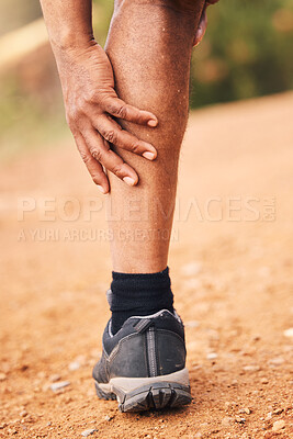 Buy stock photo Leg pain, injury and hands of senior black man after hiking accident outdoors. Sports, training hike or elderly male with fibromyalgia, legs inflammation or arthritis, broken bones or painful muscles
