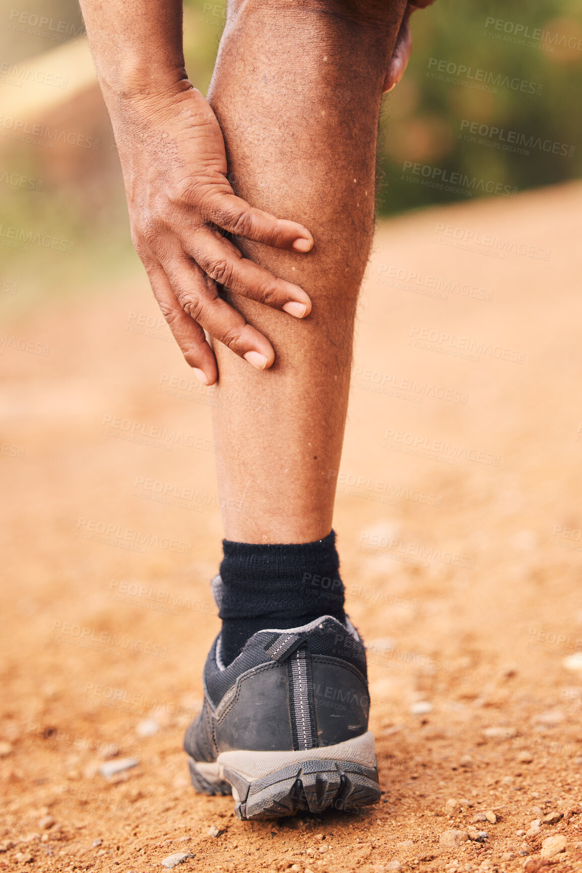 Buy stock photo Leg pain, injury and hands of senior black man after hiking accident outdoors. Sports, training hike or elderly male with fibromyalgia, legs inflammation or arthritis, broken bones or painful muscles