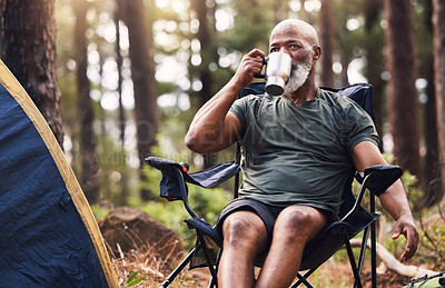 Buy stock photo Camping, hiking and coffee with a senior black man in the forest enjoying a drink during retirement. Nature, relax and wellness with an elderly male drinking a beverage in the woods on a hike