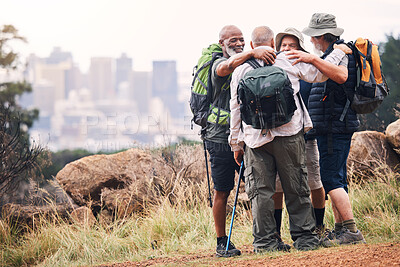 Buy stock photo Hiking, city and hug with old men on mountain for fitness, trekking and backpacking adventure with mockup. Support, motivation and expedition with friends on trail for health, retirement and journey