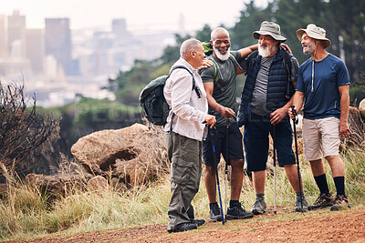 Buy stock photo Hiking, support and hug with old men on mountain for fitness, trekking or adventure with city mockup. Motivation, discovery and travel with group of friends on trail for health, retirement or journey