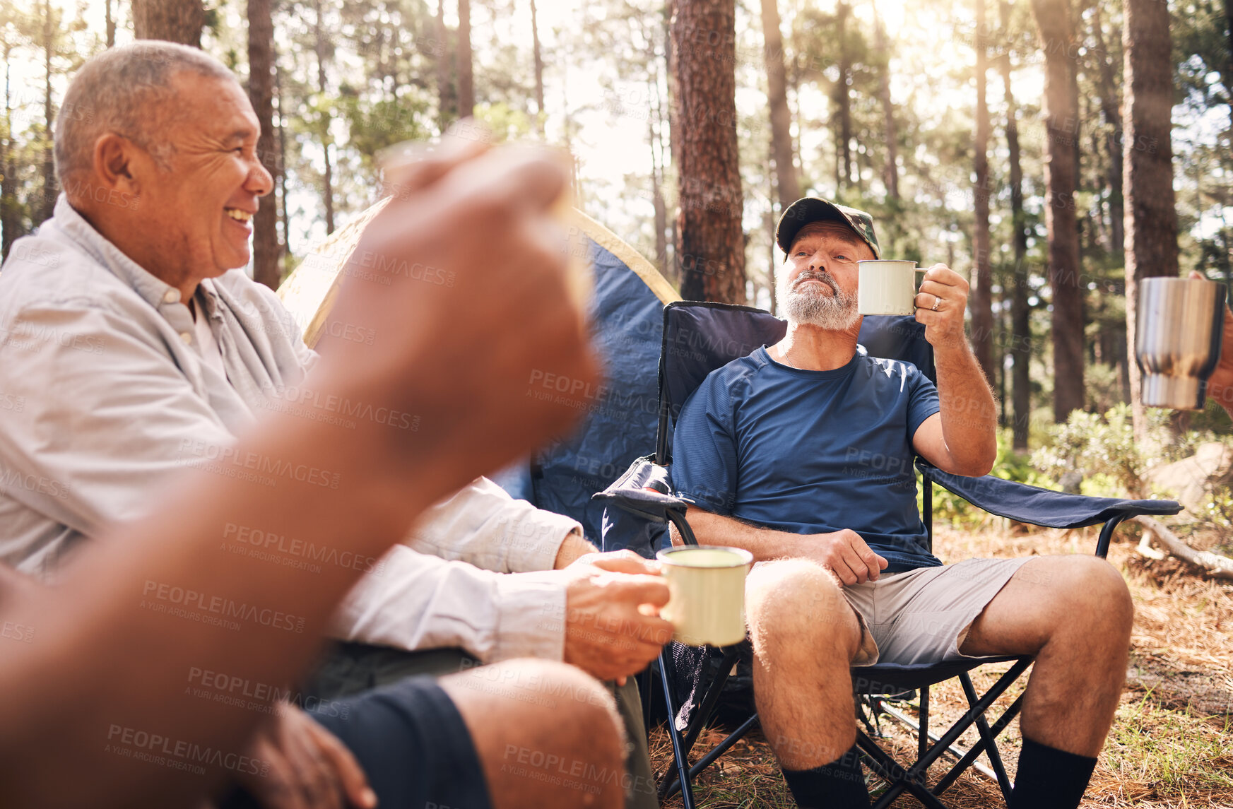 Buy stock photo Camping, trekking and senior men with coffee in nature enjoying drink, toasting in retirement celebration or travel. Elderly friends raising cup on camp chairs for friendship adventure in the forest
