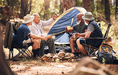 Buy stock photo Man, friends and camping in nature with coffee for travel, adventure or summer getaway together on chairs in forest. Group of men relaxing, talking or enjoying natural camp out by trees in outdoors