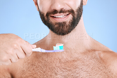 Buy stock photo Brushing teeth, studio face and man with toothbrush, dental wellness and healthy mouth care. Happy male model, oral cleaning and smile for fresh breath, facial happiness and toothpaste for cosmetics