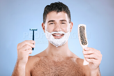 Buy stock photo Portrait, man and brush with razor, cream and mockup with guy, hygiene and grooming on blue studio background. Face, male or gentleman with skincare, cosmetic equipment or hair removal for confidence