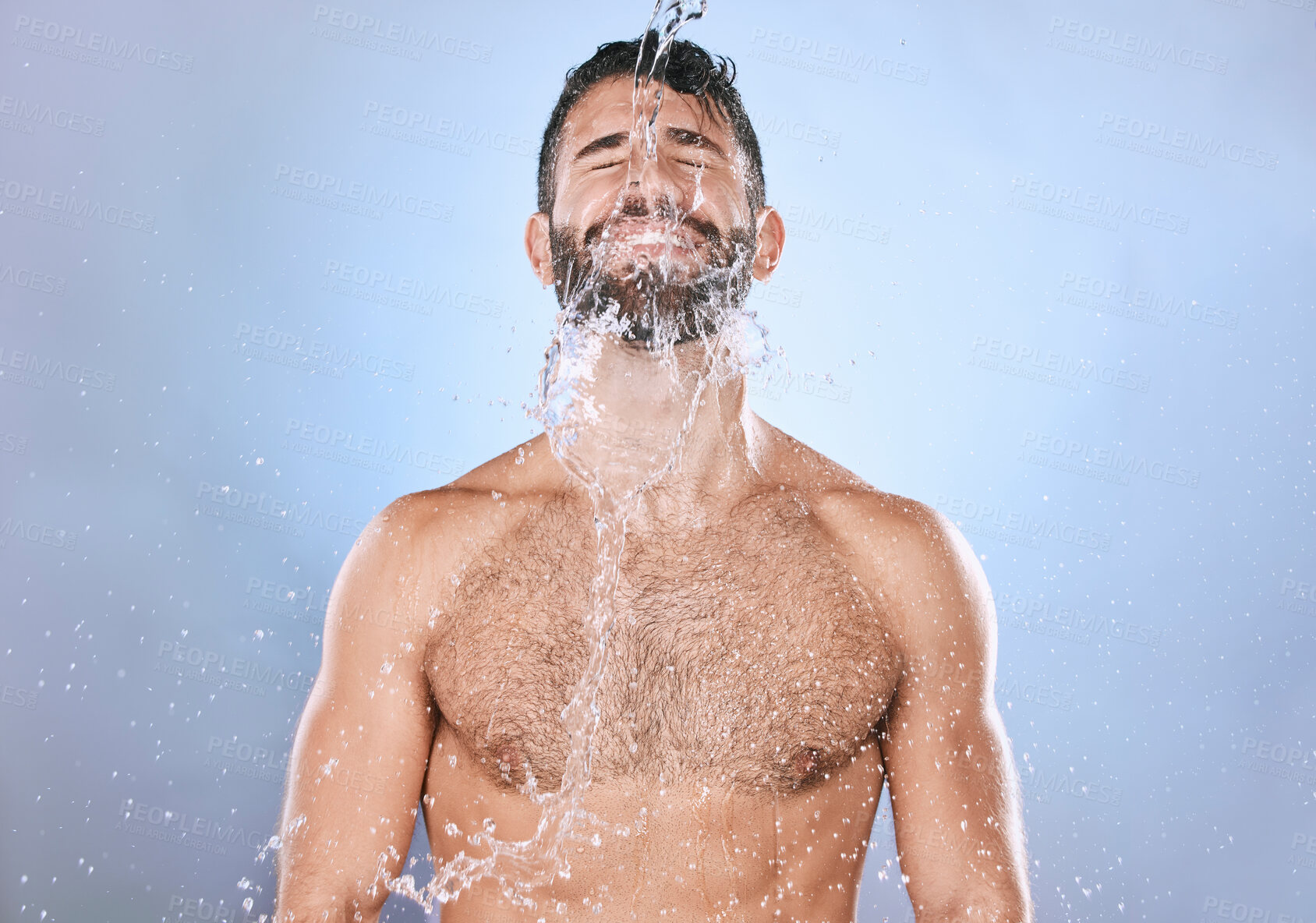 Buy stock photo Man, water splash and skin care or shower with clean face for beauty, hygiene and dermatology. Aesthetic model person on blue background for health and wellness cosmetics, body and detox cleaning