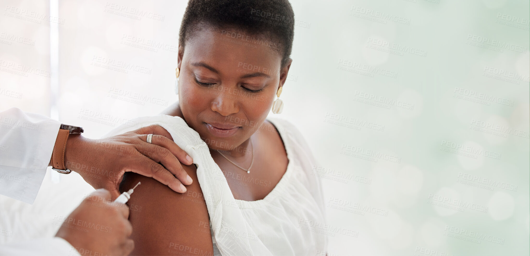 Buy stock photo Black woman, covid vaccine injection and mockup space in hospital with doctor, nurse and blurred background. African patient, medic and medical mock up for healthcare, wellness and public service