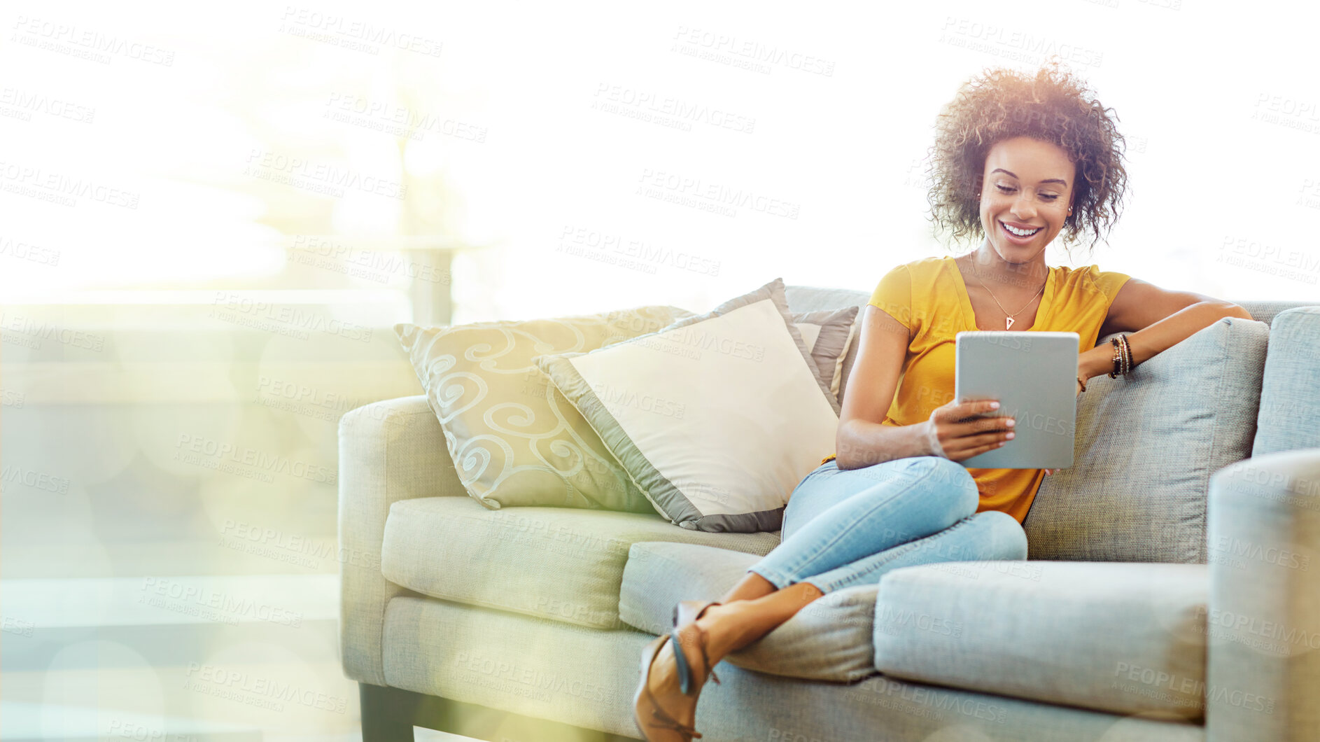 Buy stock photo Black woman, tablet and sofa with mockup space with smile, blurred background and happy for meme on app. African gen z girl, home living room and mobile touchscreen in mock up for social network ux