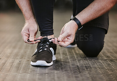 Buy stock photo Fitness, hands and tie shoes in gym to start workout, training or exercise for wellness. Sports, athlete and man tying sneakers or footwear laces to get ready for exercising or running for health.