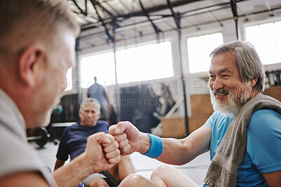 Buy stock photo Fitness, gym and men with fist bump for senior support, personal trainer goals and exercise progress. Japanese or asian elderly person with teamwork, achievement and success hand sign for training