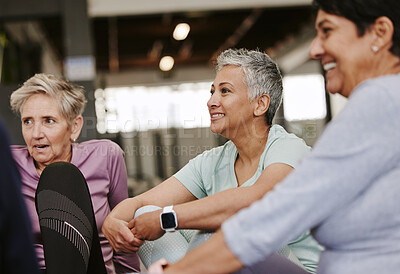 Buy stock photo Fitness, health and group of senior women talking while resting after workout in the gym. Conversation, wellness and healthy elderly female friends speaking after exercise or training in sport center