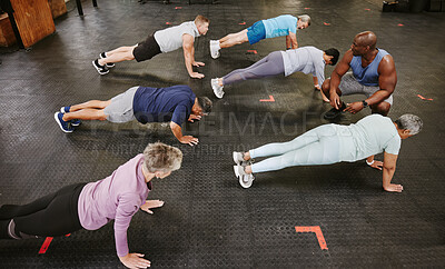People, fitness and stretching in class at gym for workout, squat