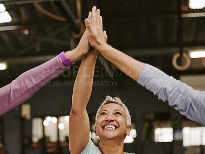 Buy stock photo Fitness, teamwork and high five of senior women in gym celebrating workout goals. Sports targets, laughing face and group of happy friends with hands together for success and exercise achievements.