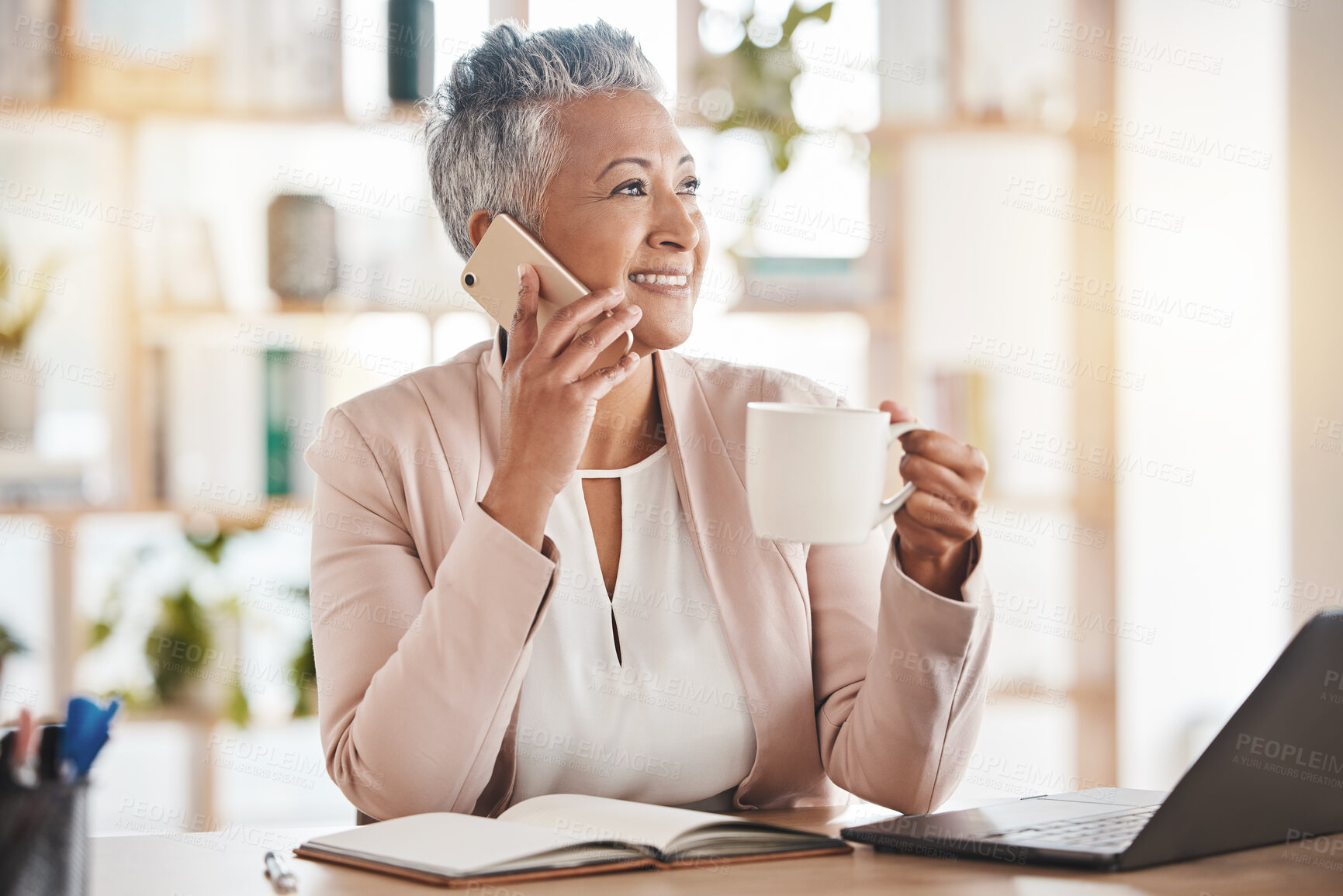 Buy stock photo Senior woman, phone call and coffee by laptop in communication, conversation or discussion at office desk. Elderly female on smartphone smiling with cup talking about business idea plan or networking
