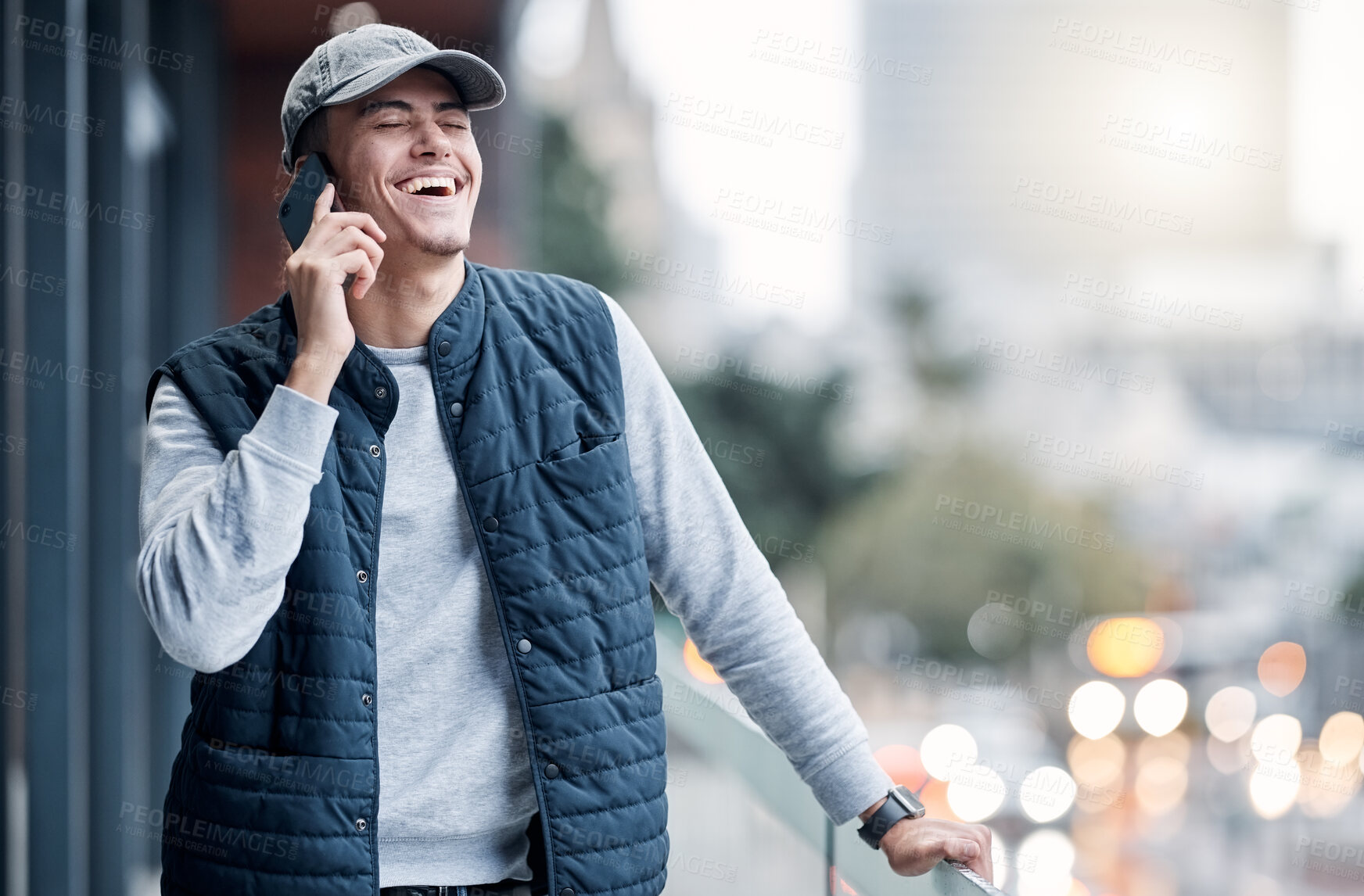 Buy stock photo Phone call, communication and man happy in city for conversation, laughing and talking in New York. Networking, 5g connection and young male with smartphone for speaking, chatting and online contact