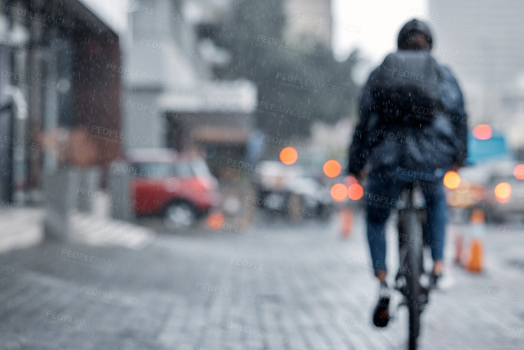 Buy stock photo Cyclist, bicycle and delivery in the city on rainy day or cold weather in an urban town on mockup. Biker riding in the rain with cargo, transport or deliver service in a urban town street for courier