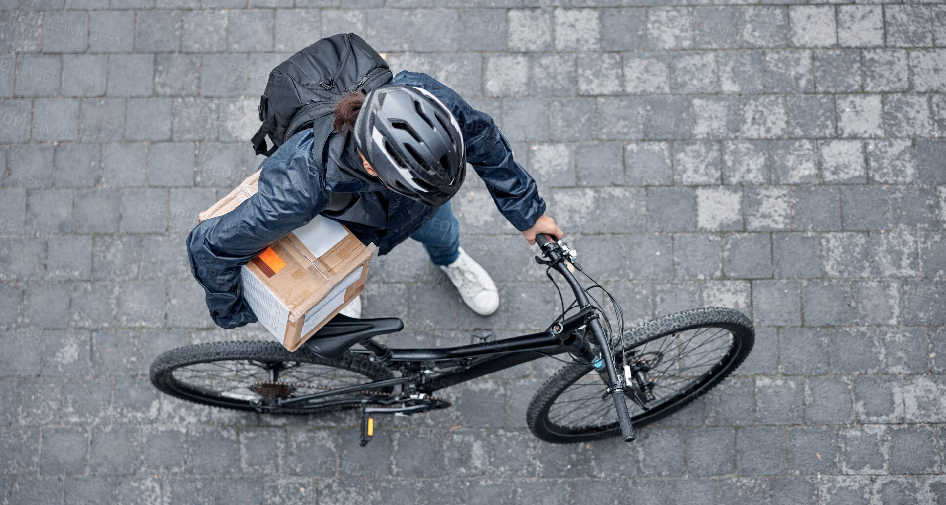 Buy stock photo Delivery, package and man with a bicycle and box in the street for consumer order in the city. Transport, courier and male bike driver with stock with eco friendly transportation in the road in town.