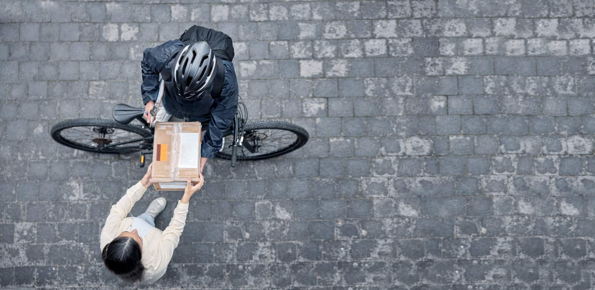 Buy stock photo Bicycle courier, woman with box from above and package from online shopping website standing in road. Logistics, delivery and bike driver with parcel and eco friendly transport for customer in street