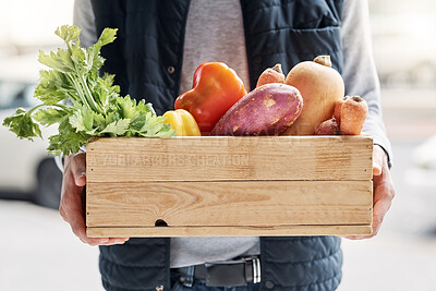 Buy stock photo Grocery delivery, courier and hands of man with retail sales product, food shopping or vegetables shipping container. Logistics supply chain, health nutritionist and distribution person with package