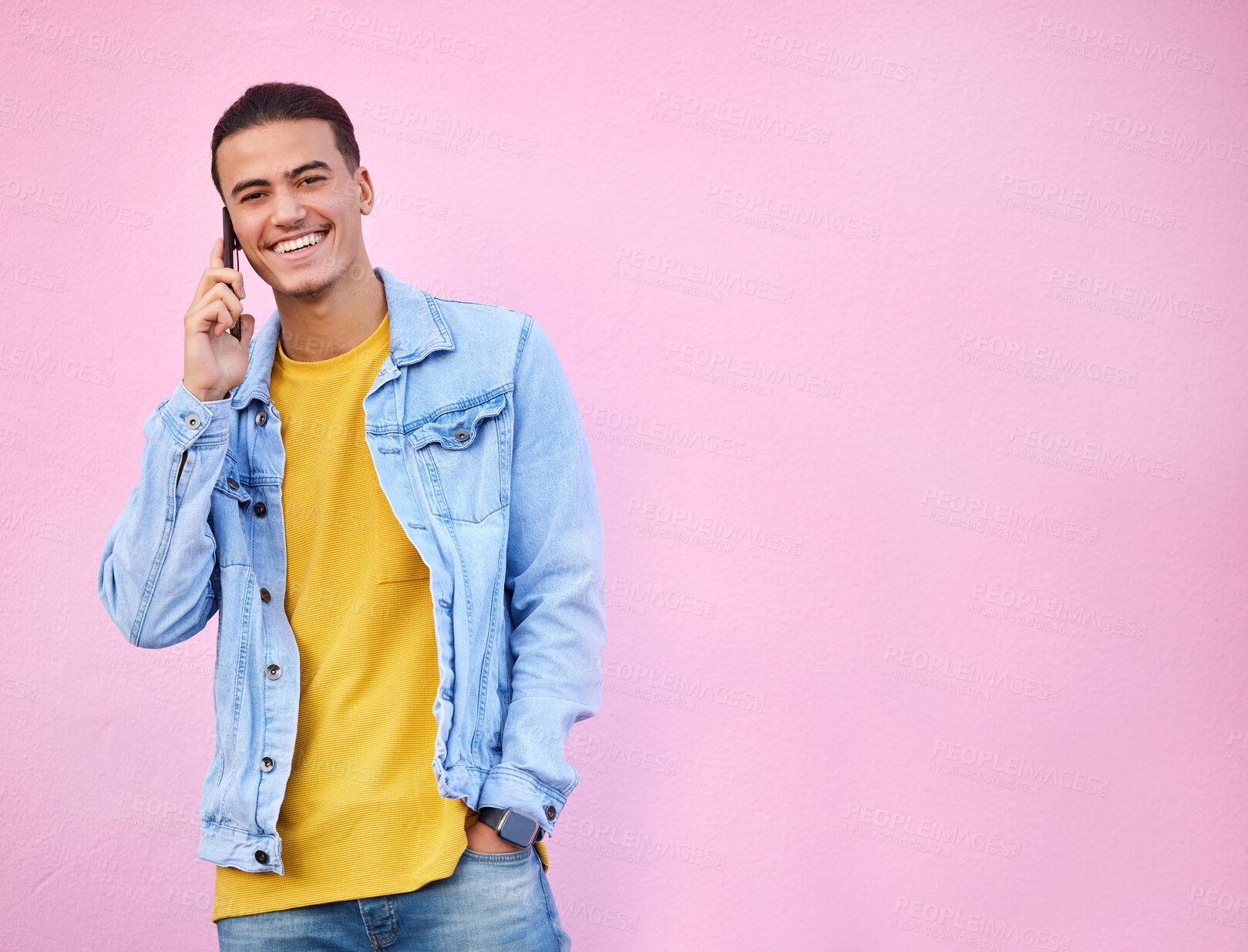 Buy stock photo Phone call, happy and portrait of a man in a studio with a casual, trendy and stylish outfit. Happy, smile and male model on mobile conversation with cellphone by a pink background with mockup space.