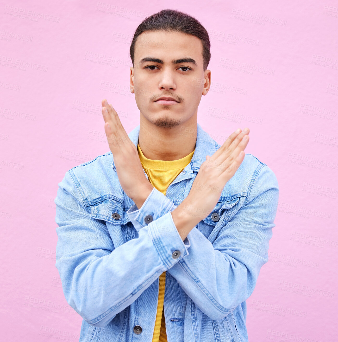 Buy stock photo No, stop and portrait of a man with hands as a sign isolated on a pink studio background. Angry, caution and serious person with a rejection, decline and problem gesture with arms on a backdrop