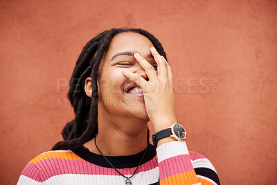 Buy stock photo Happy, laughter and freedom with a black woman on an orange background outdoor for joy or humor. Funny, laugh and smile with an african american person laughing or joking against a color wall