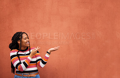 Buy stock photo Mockup, happy or black woman with marketing, product placement or branding space on wall background. Smile or African gen z girl advertising discount deal, sales offer or promotion announcement