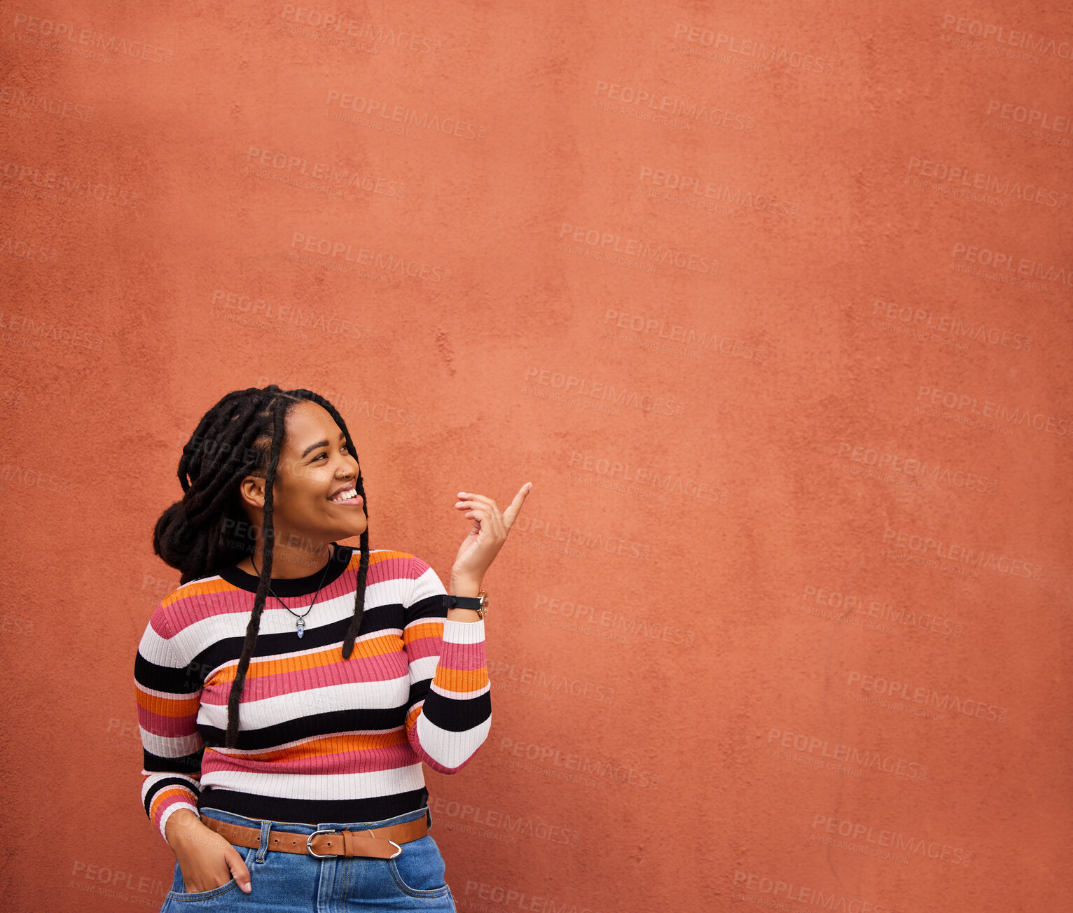 Buy stock photo Mockup, pointing or black woman with marketing, product placement or branding space on wall background. Smile or African gen z girl advertising discount deal, sales offer or promotion announcement