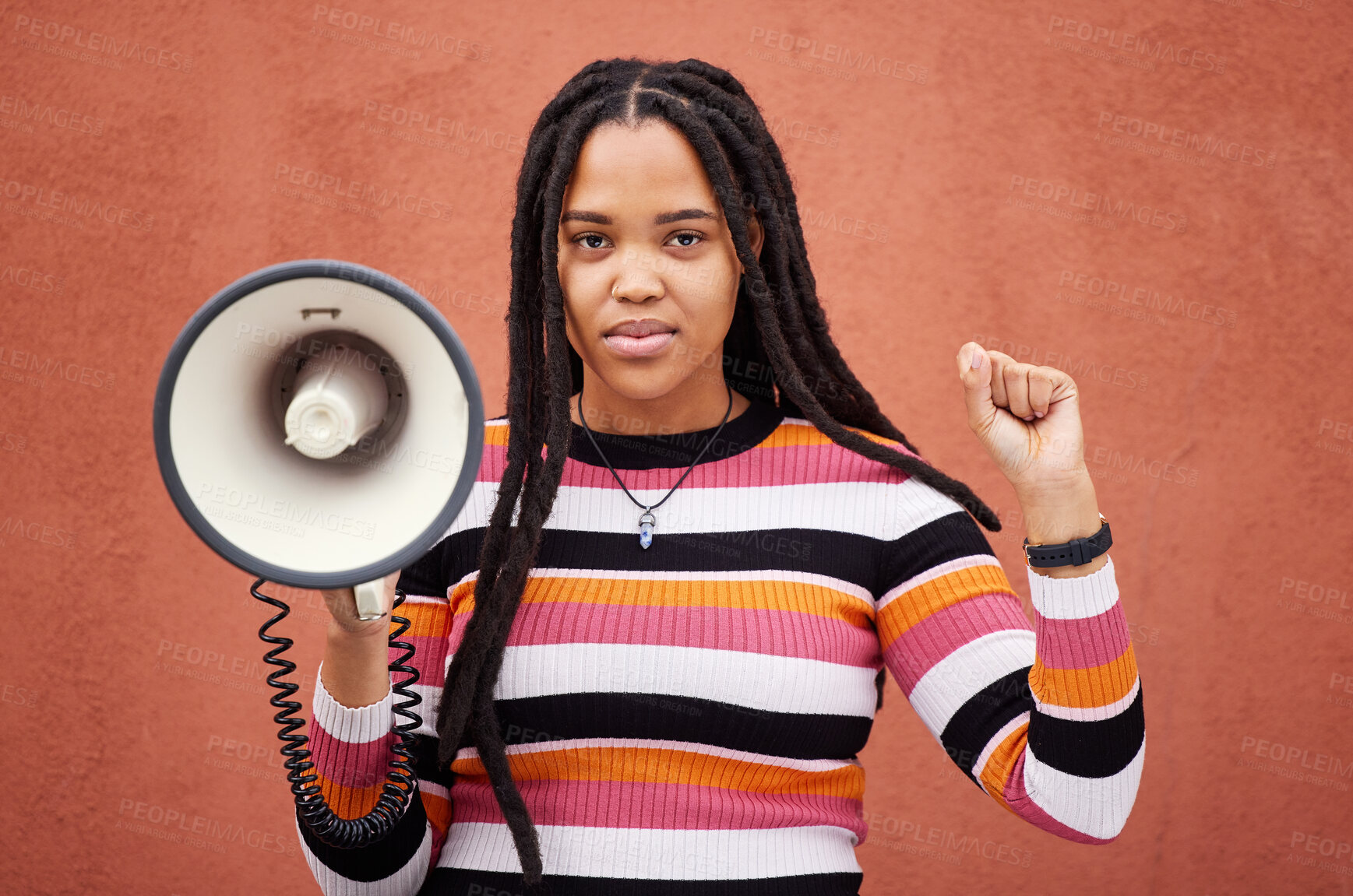 Buy stock photo Megaphone, portrait or black woman protest with speech announcement for politics, equality or human rights. Feminist leader, revolution or gen z girl with sound device for justice on wall background