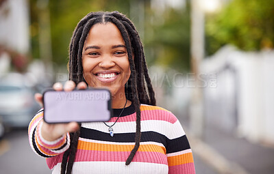 Buy stock photo Mockup, phone and screen, portrait and black woman in road for travel, advertising and copy space. Face, smartphone and display by student traveling, connect or social media app on blurred background