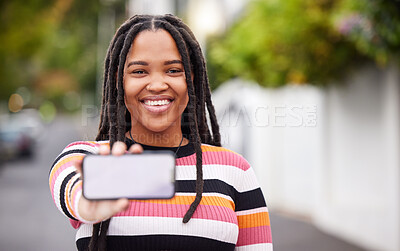 Buy stock photo Phone, mockup and screen, portrait and black woman in road for travel, advertising and copy space. Face, smartphone and display by student traveling, connect or social media app on blurred background