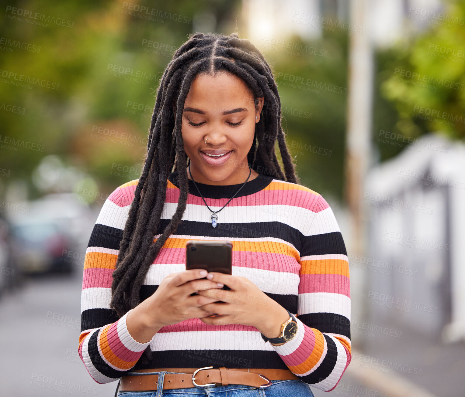 Buy stock photo Black woman with phone in city, happy outdoor with technology, chat and communication, travel and fashion. Social media, urban street and adventure with female, connectivity and 5g in Jamaica