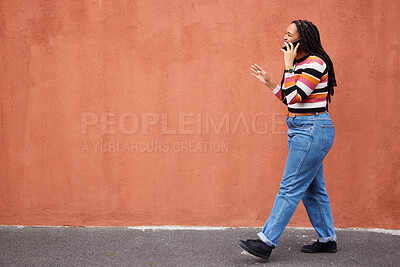 Buy stock photo Mockup, phone call and black woman in a city street against orange background for advertising. Walking, talking and girl speaking on copy space outdoor for relax, trip and social network on space