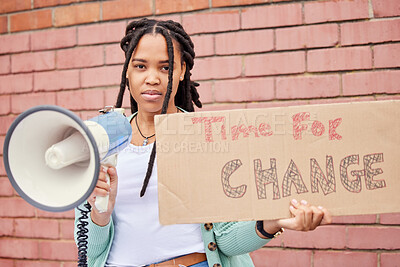 Buy stock photo Poster, portrait and woman on megaphone for change, protest or human rights on brick wall background. Banner, speaker and face of girl for announcement of global, transformation or freedom mission