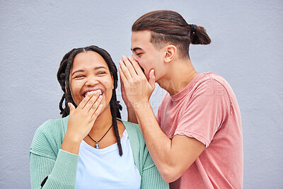 Buy stock photo Love, secret and man whisper to his girlfriend a funny story, joke or information by a wall in city. Comic, laughing and guy talking in woman ear for gossip while in town on holiday or weekend trip.