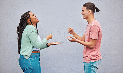 Buy stock photo Happy, friends and game with hands of people and wall background for competition, decision and challenge. Rock, paper and scissors with man and black woman playing for funny, smile and strategy