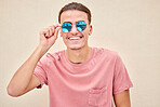 Man, face and retro fashion sunglasses on isolated background for marketing branding, optometry sales or mock up. Smile, happy and model student and summer optician vision or eyes healthcare wellness