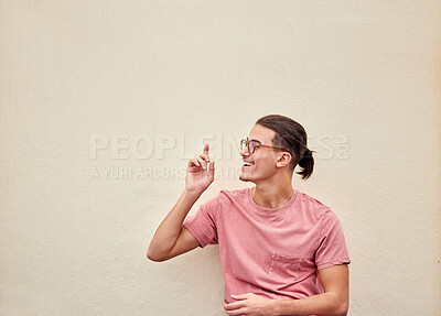 Buy stock photo Happy man, glasses or pointing up on isolated background for advertising branding, optometry sales deal or mockup marketing. Model, student or showing hands gesture in fashion eyes vision or support