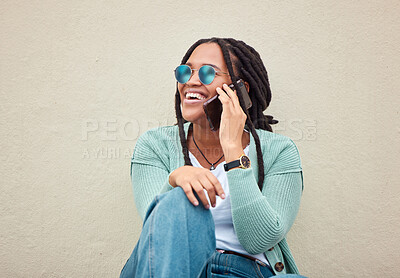 Buy stock photo Black woman, phone call and sunglasses by wall in city, happy and smile with fashion in summer. Young gen z, african student girl or smartphone for travel, urban adventure or aesthetic with happiness