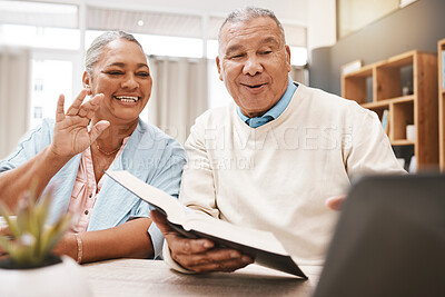 Buy stock photo Wave, laptop and senior couple on video call with book or bible for spiritual studying or reading in home. Greeting, retirement and elderly man and woman waving on online or web chat with computer.