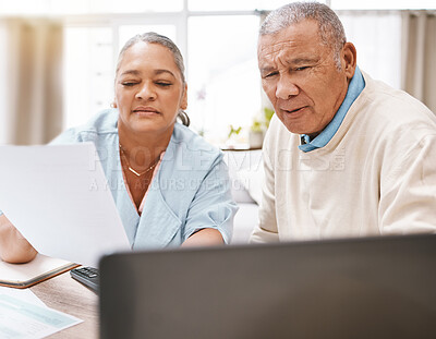 Buy stock photo Senior black couple, documents and laptop for planning, budget and taxes with talk for future in home. Old man, woman and reading pc screen for insurance, retirement or finance goals with paperwork