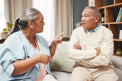 Buy stock photo Senior couple, fight and angry on sofa for marriage problems, conflict and communication. Divorce, argument and frustrated partner of man, woman and people in anger, living room and blame of affair